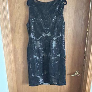 Black sheath sleevless dress with nude lining and sequences